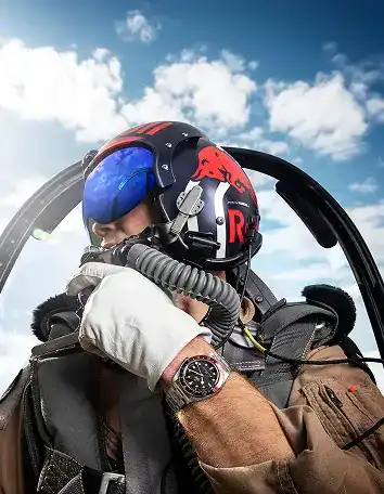 Pilot wearing a Tudor watch in an aircraft cockpit - Washington Watches