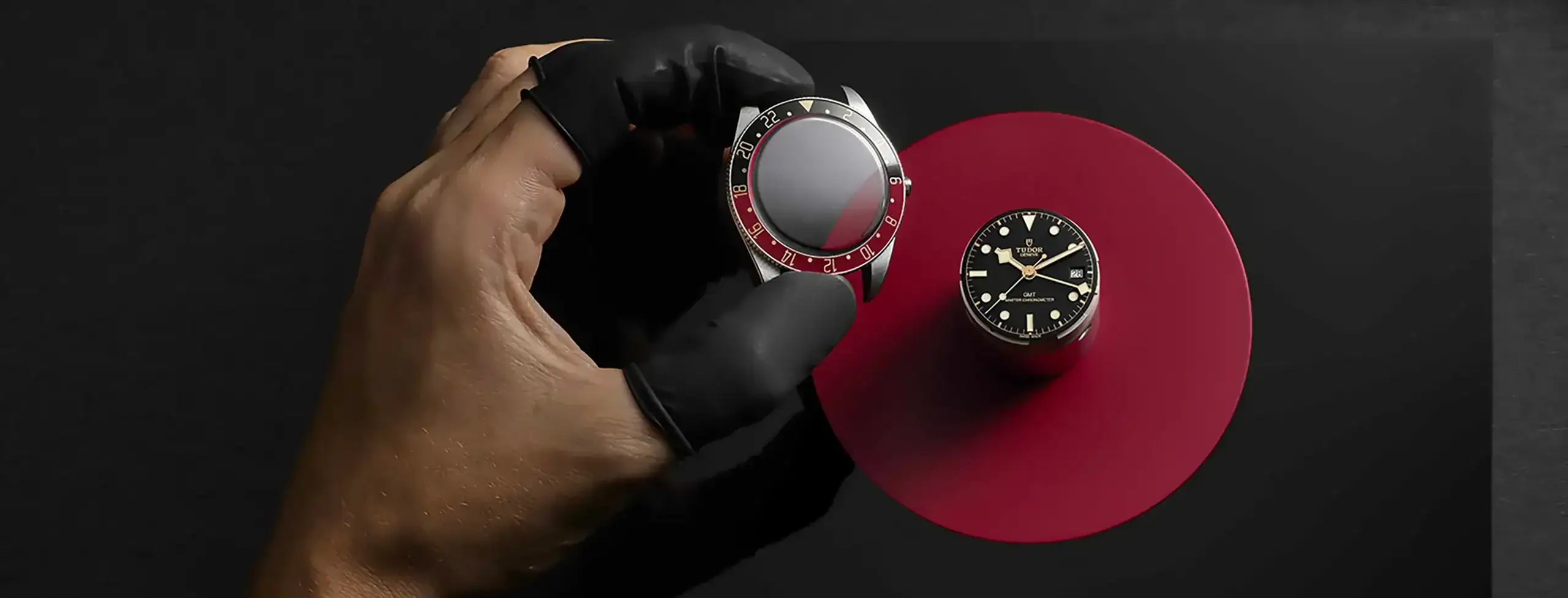 Tudor watch case and red bezel being assembled - Washington Watches